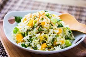 This vibrant golden coconut rice topped with roasted mango and lime cashews is a tropical, vegan side dish that's gluten-free and perfect for summer. Sweet, savory, and refreshing!