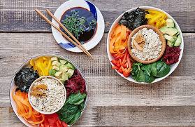 These rainbow veggie sushi bowls are a colorful, no-roll way to enjoy sushi at home. Topped with ginger-sesame dressing, they’re vegan, gluten-free, and full of fresh flavor.