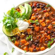 This spicy black bean and sweet potato chili is a hearty vegan meal packed with flavor and nutrition. Easy one-pot recipe perfect for cozy dinners and meal prep.