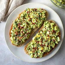 Avocado toast with poached egg & chili flakes